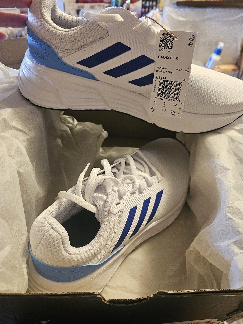 Adidas White Running Shoes with Blue Stripes